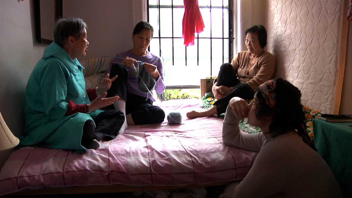 Still from "Your Day is My Night". From left: Sheut Hing Lee, Linda Chan, Ellen Ho, and Veraalba Santa ("Lourdes")